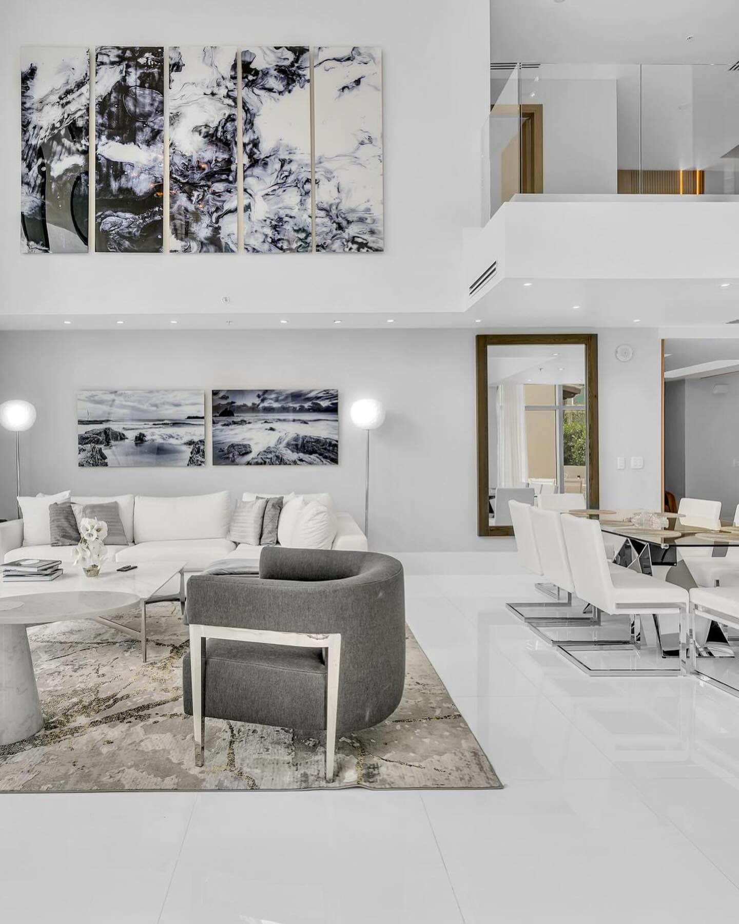 Great room seating area with large-scale artwork